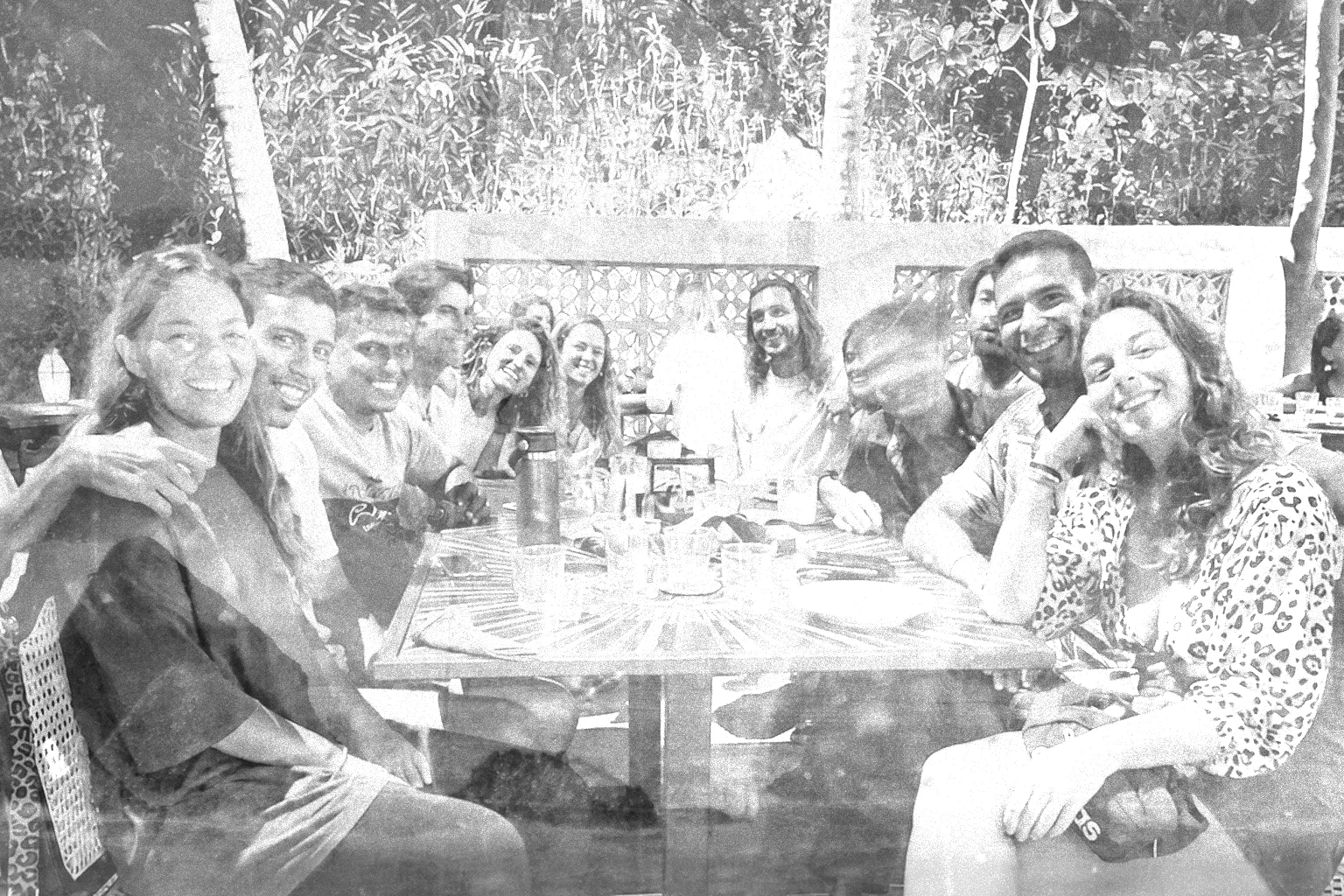 Friends gathered around a long table